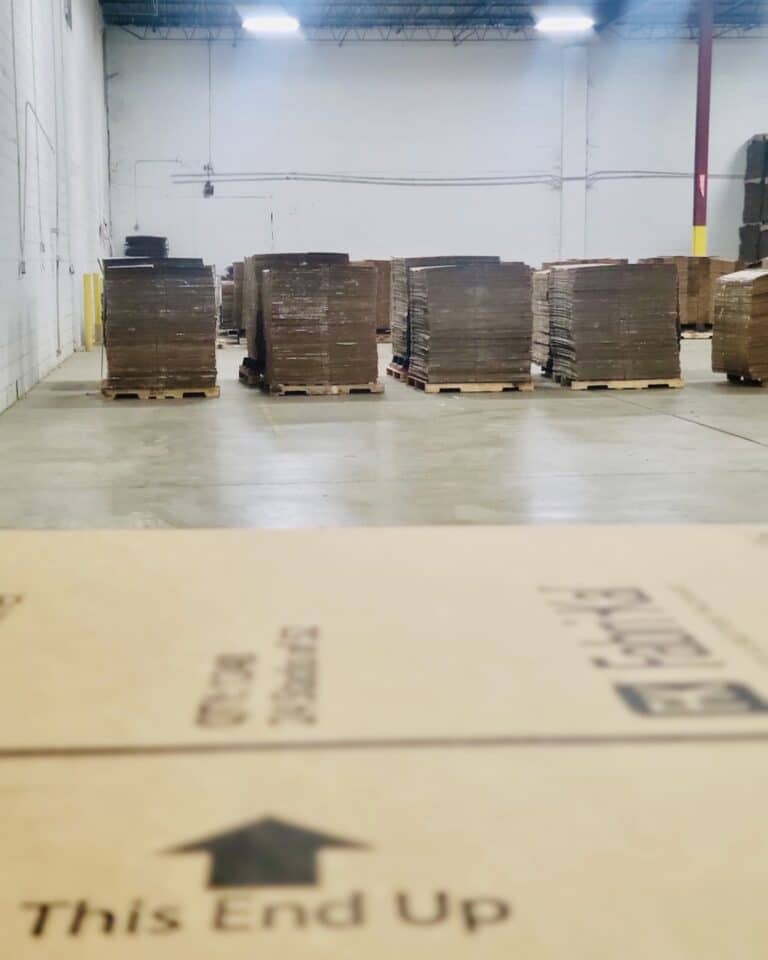 pallets of cardboard from corporate recycling collection